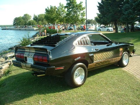 1978 Ford Mustang II - This 1978 Ford Mustang II Cobra II features distinctive rear window louvers and prominent side graphics.