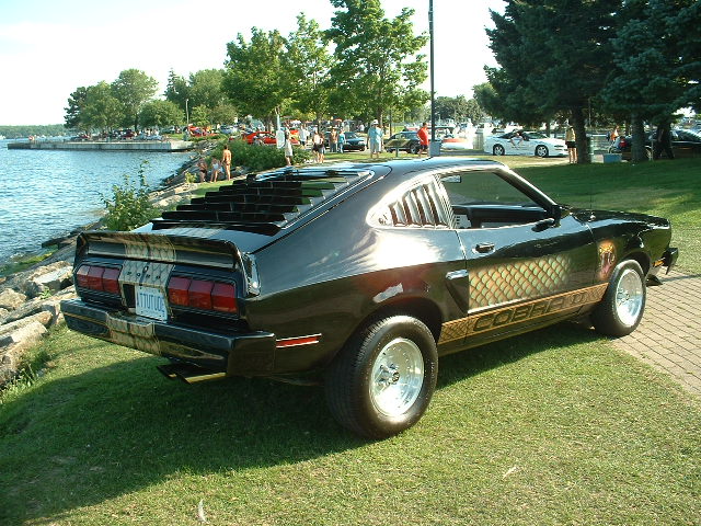 Black 1978 Ford Mustang II Cobra II with louvers and side stripes