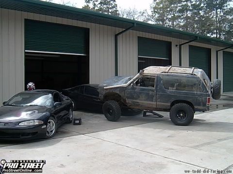 1992 Chevrolet S10 - Modified 1992 Chevrolet S10 with off-road tires and a spare tire on the back.