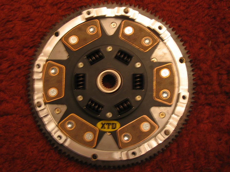 Clutch disc with XTD logo and Supermotors.net watermark