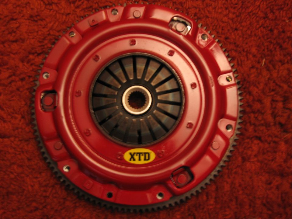red clutch assembly with yellow XTD sticker
