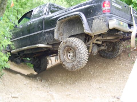 1977 Ford F-150 - This Dodge pickup is equipped for off-road use with large tires and lifted suspension.
