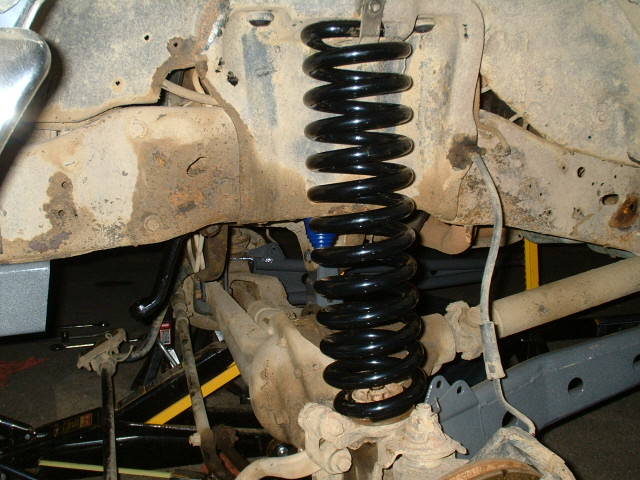 Drivers side spring in