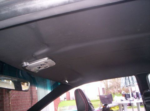 1993 Ford Probe - Interior view of a car's headliner and overhead console.