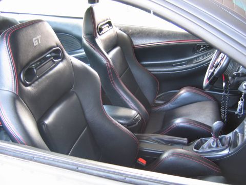 1993 Ford Probe - Interior view of a 1993 Ford Probe, highlighting its sporty bucket seats and dashboard details.