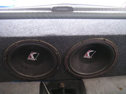 1994 Ford Bronco - This photo shows a pair of Kicker subwoofers installed in a custom enclosure.