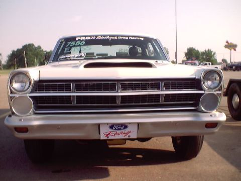 1967 Ford Fairlane - Front view of a white 1967 Ford Fairlane, a hood scoop and a Ford Racing license plate.