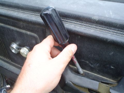 1981 Ford Bronco - removed the screw here and the window crank to move the door molding so I could remove the speaker to disconnect the speaker wiring so I co…