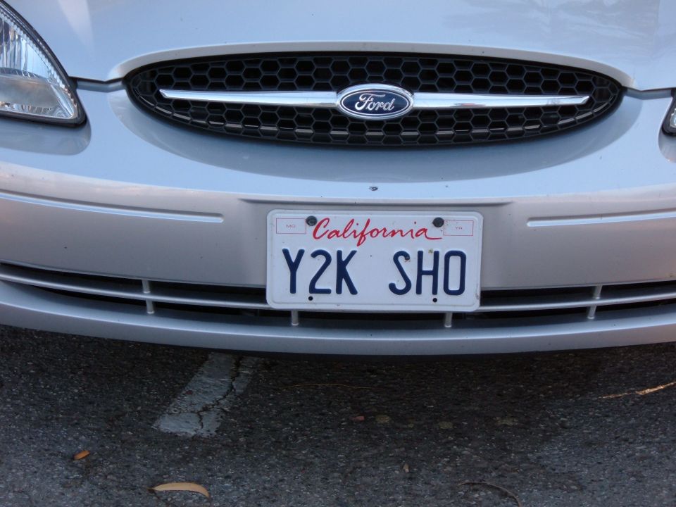 Silver 1995 Ford Taurus front end with California license plate Y2K SHO
