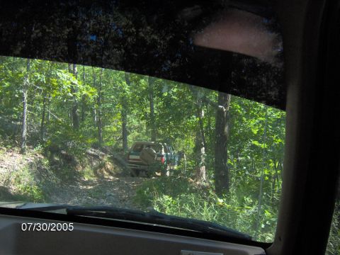 1978 Ford Bronco - Multiple SUVs navigate a wooded trail on a sunny day. The date 07/30/2005 is visible.