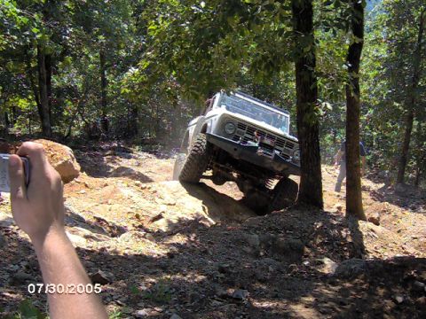 1978 Ford Bronco - This 1978 Ford Bronco navigates a challenging off-road trail with steep inclines and rocky obstacles.