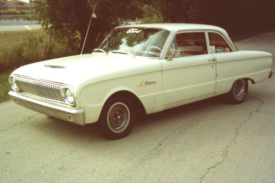 White two-door Ford Falcon from the early 1960s