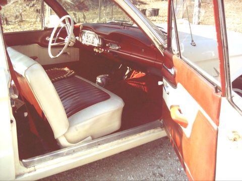 1962 Ford Falcon - Interior view of a 1962 Ford Falcon, highlighting the two-tone seats and dashboard details.