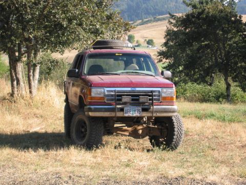 1991 Ford Explorer - This lifted 1991 Ford Explorer is ready for off-road adventures with its aggressive tires and spare tire mounted on the roof rack.