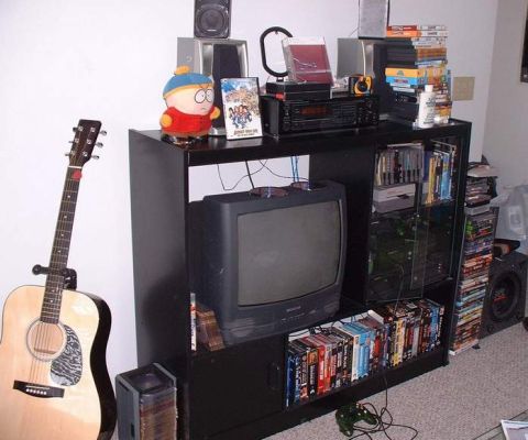 2006 Ford E350 - This is our living room entertainment center. We have XBox, Nintendo, a DVD/VCR combo, and tons of DVDs and videos. There's a 4-channel spe…