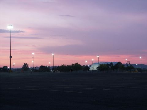 2001 Mercury Grand Marquis - Empty parking lot at dawn with streetlights illuminating the scene.