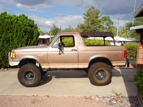 1989 Ford Bronco - This 1989 Ford Bronco is shown from the side with its soft top installed.