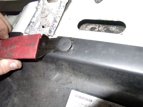 1990 Lincoln Town Car - Just pop the six of these plastic clips out with a trim tool.
