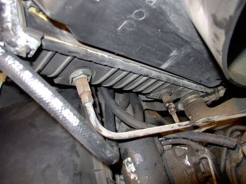 1990 Lincoln Town Car - On my Lincoln the hot fluid comes from the trans to the higher fitting on the rad and returns via the lower rad line to the trans, somewhat…
