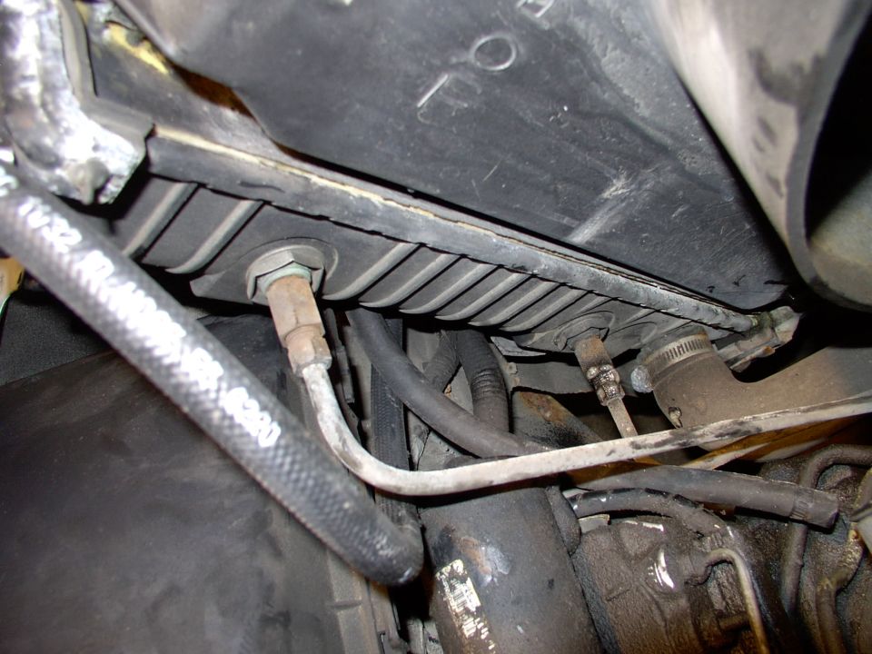 On my Lincoln the hot fluid comes from the trans to the higher fitting on the rad and returns via the lower rad line to the trans, somewhat cooler than before it's trip through the rad.