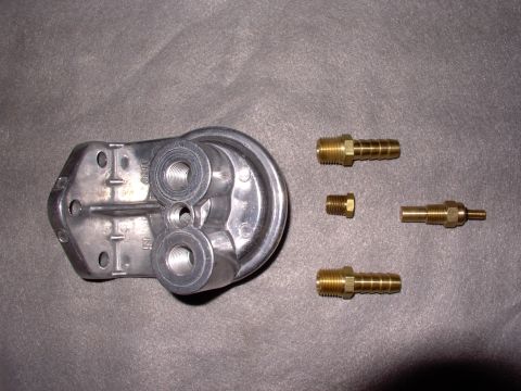 1990 Lincoln Town Car - The block off plug(middle left) comes in case you you don't want to install the temp sender unit (from a $10 temp gauge).
