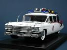 2000 Isuzu Rodeo - A white 1959 Cadillac Miller-Meteor ambulance, often recognized as the Ecto-1 from Ghostbusters, is displayed on a stand.