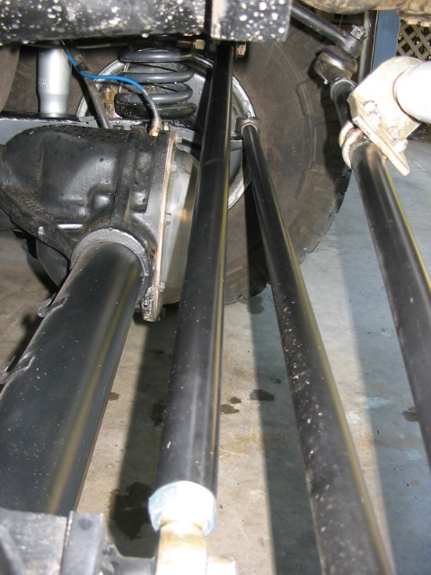 1995 Ford Bronco - Detailed view of a vehicle's modified suspension and axle system.