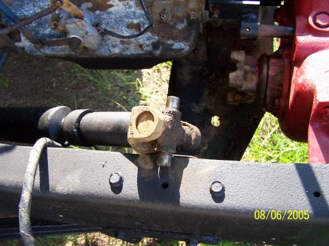 1976 Ford F-150 - Close-up view of a driveshaft universal joint and related components on a vehicle's frame, with a date stamp of 08/06/2005.
