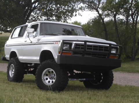 1979 Ford Bronco - This lifted 1978 Ford Bronco features a prominent bull bar and large off-road tires.
