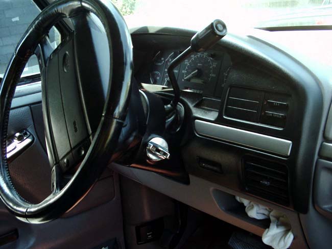 1994 Ford Bronco interior with steering wheel and dashboard