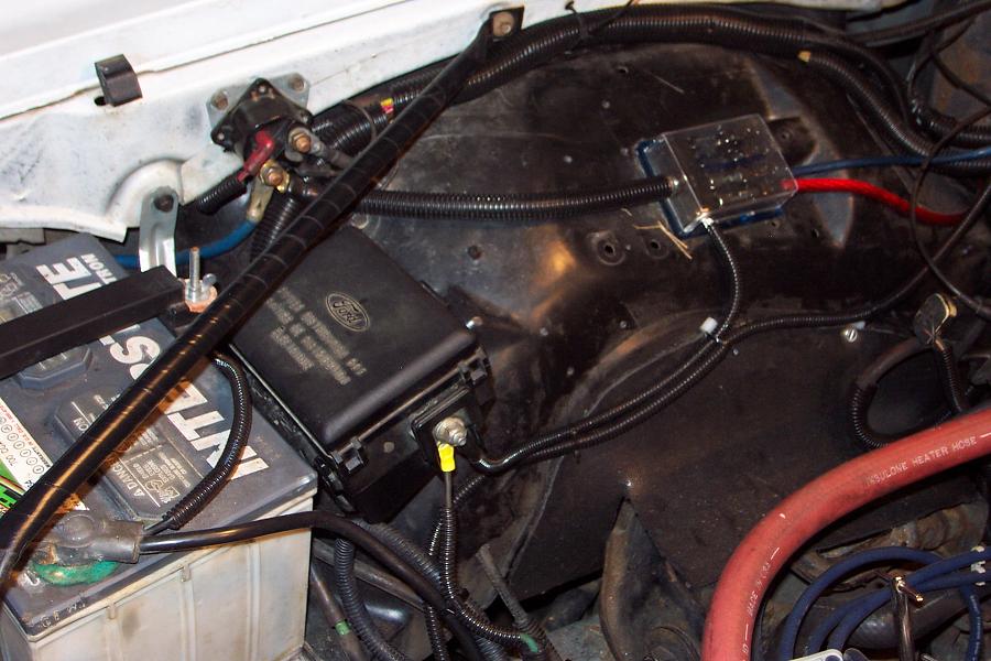Ford fuse box and battery in engine bay