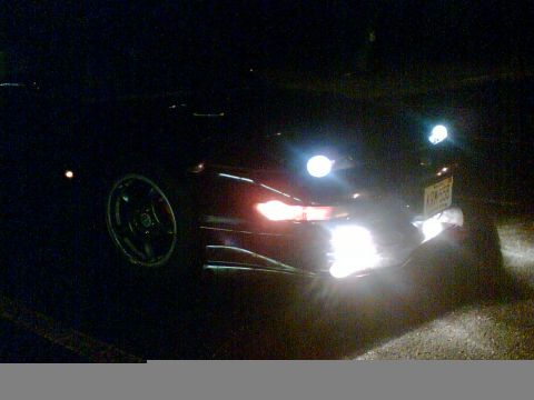 1997 Ford Probe - A 1997 Ford Probe is seen at night with its headlights illuminated.