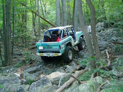 1969 Ford Bronco - This 1969 Ford Bronco navigates a challenging rocky terrain on an off-road trail.