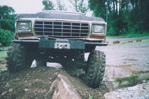 1978 Ford Bronco - This lifted 1978 Ford Bronco is equipped with large off-road tires and a front-mounted winch for challenging terrain.