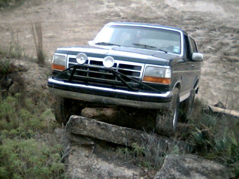 1992 Ford Bronco - This 1992 Ford Bronco is shown tackling a challenging off-road course.