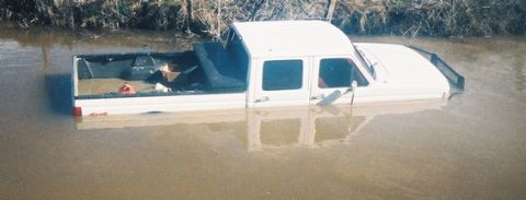 1993 Ford F-350 - Still wont float... I had no 4wd, thanks to the trusty auto hubs. Got stuck in hte middle of a river. Sole reason I switched to manual hubs…