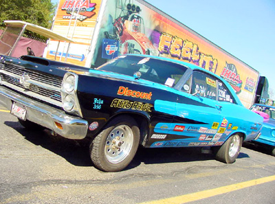 1966 Ford Fairlane - This 1966 Ford Fairlane is set up for drag racing, extensive sponsor decals and a prominent "Discount Auto Parts" logo.