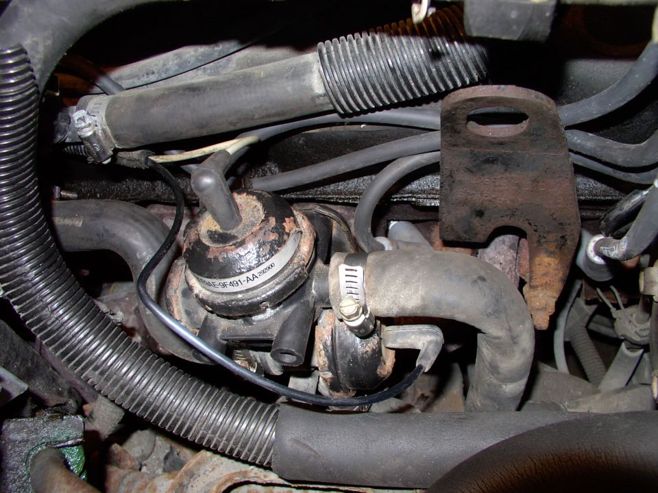All back together on the passenger's side. The driver's side took 10 minutes compared to the two hours I spent messing around on this side. Note the properly repaired air pump diverter valve vacuum hose boot ! No more vacuum leak.