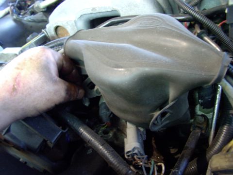 1990 Lincoln Town Car - Step one remove stock distributor cap weather condom.