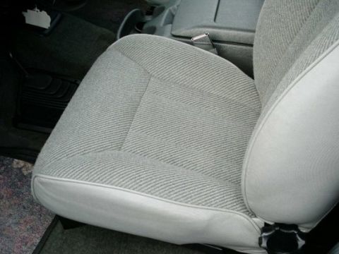 1992 Ford Bronco - Interior view of car seats, showing fabric upholstery and side trim.