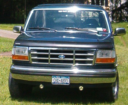 1992 Ford Bronco - Front view of a 1992 Ford Bronco, showing its grille and headlights.