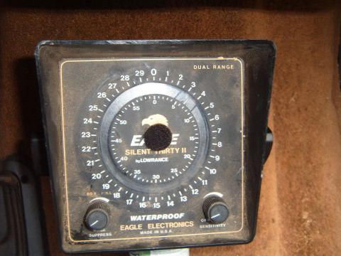 1988 Ford Bronco - Close-up of an Eagle Electronics depth finder gauge, likely from a boat or vehicle interior.