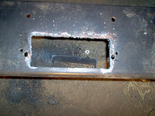 Cutout in metal bumper for winch installation