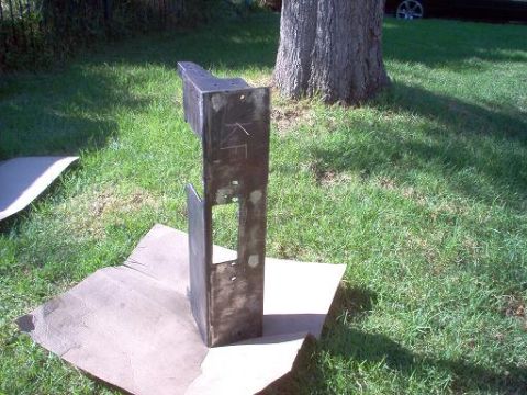 1988 Ford Bronco - A fabricated metal bumper component is shown outdoors on a grassy lawn.