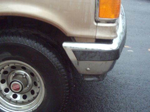 1988 Ford Bronco - We pulled the bumper out from the accident, but then hit a stump out wheeling, and knocked it back into place.