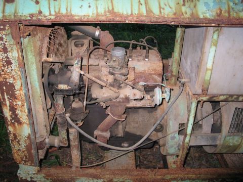 2004 Ford F-150 - This photo shows a rusty engine and fan assembly, not a 2004 Ford F-150.