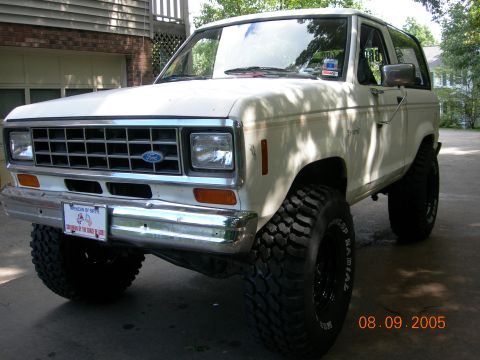 1984 Ford Bronco II - White 1984 Ford Bronco II shown from the front three-quarter view.