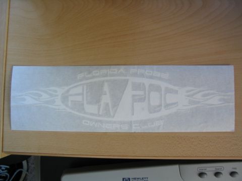 1997 Ford Probe - Decal for the Florida Probe Owners Club is shown on a wooden surface.