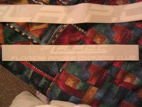 1997 Ford Probe - Decals for the Florida Probe Owners Club are shown against a patterned background.