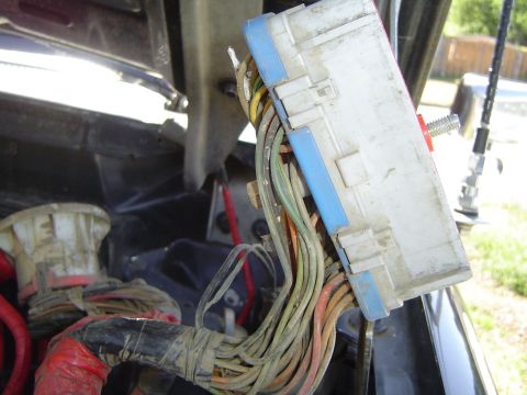 1989 Ford Bronco - You pop out this red thing, holds the wire clips in place